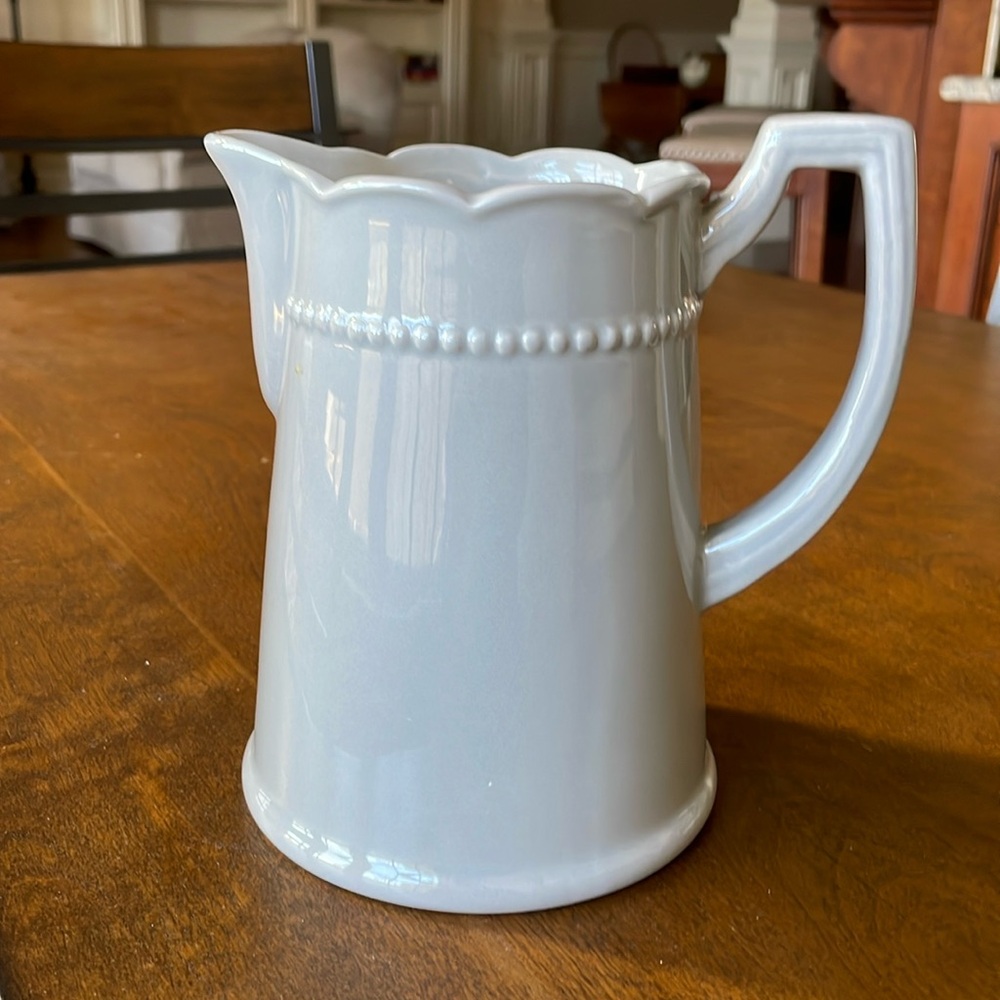 Scalloped gray pitcher